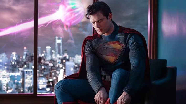 Superman putting on his boot in Superman (2025)