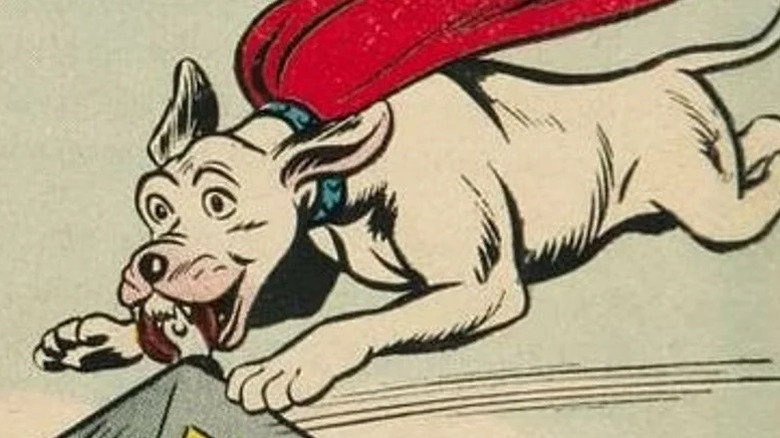 Krypto carrying a safe by the wheel in DC's comic books