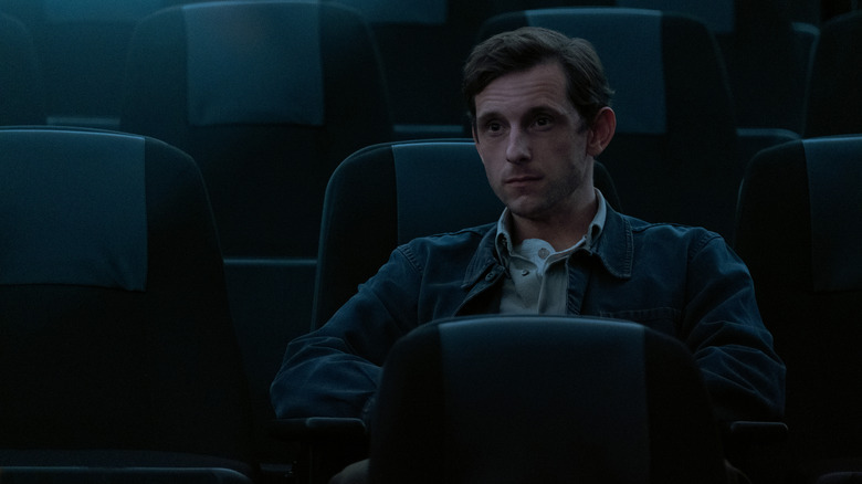 Jamie Bell sitting in a theater