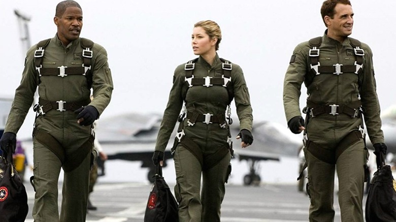 Jamie Foxx as Henry Purcell, Jessica Biel as Kara Wade, and Josh Lucas as Ben Gannon walking together in Stealth