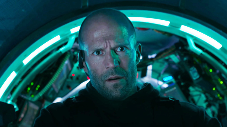 Jason Statham's Jonas Taylor stands in a submarine looking worried in The Meg