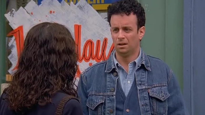 Julia Louis-Dreyfus as Elaine and Kevin McDonald as Denim Vest/Steve having a chat on Seinfeld