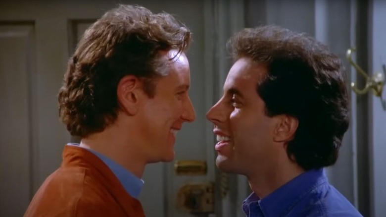 Judge Reinhold's Aaron and Jerry Seinfeld standing face to face on Seinfeld