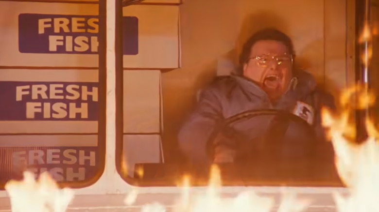 Wayne Knight as Newman screaming while driving a truck that's on fire in Seinfeld