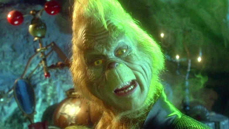 The Grinch tilts his head to the side in How the Grinch Stole Christmas