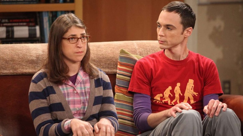 Amy looking concerned and Sheldon looking at Amy on The Big Bang Theory