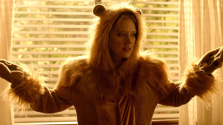 Kate McKinnon as Carole Baskin in a lion suit