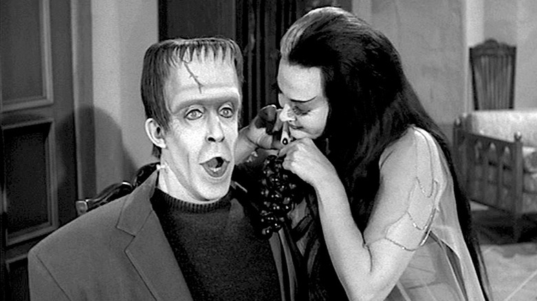 Fred Gwynne and Yvonne De Carlo eat grapes on The Munsters