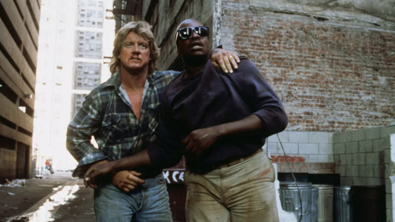 Roddy Piper and Keith David in They Live