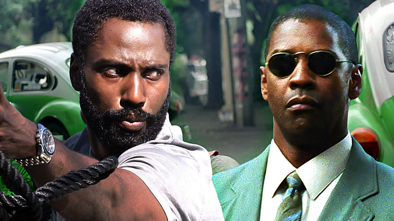 John David Washington and Denzel Washington standing side by side