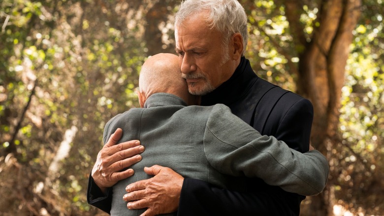 Q and Picard, hugging in the woods, in Star Trek: Picard