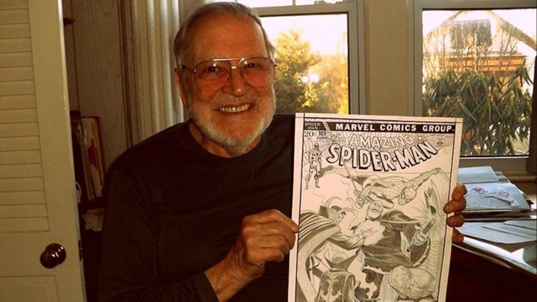 John Romita Sr with an Amazing Spider-Man cover he inked