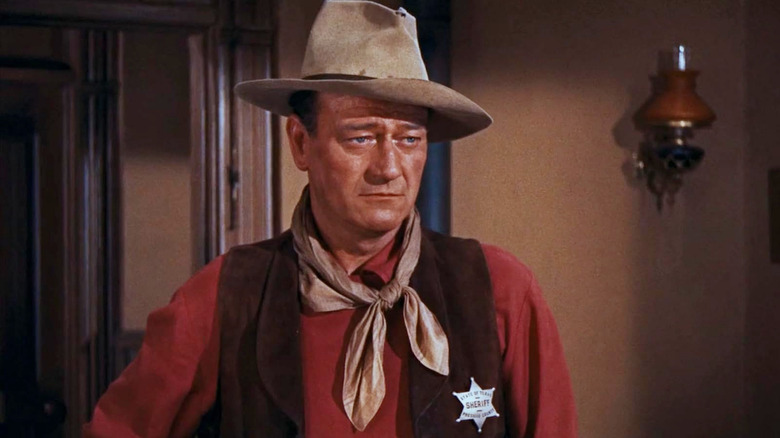 John Wayne as John T. Chance looking solemn in Rio Bravo