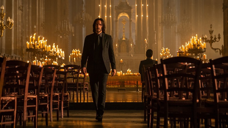 John Wick 4 with candles in church