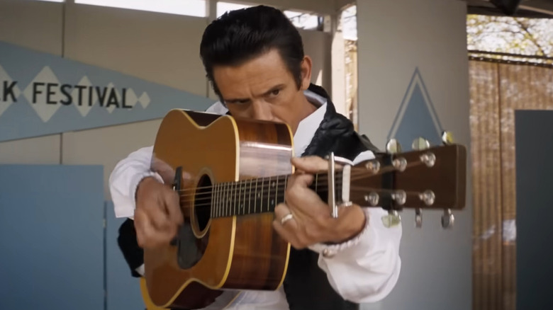 Johnny Cash playing guitar in A Complete Unknown