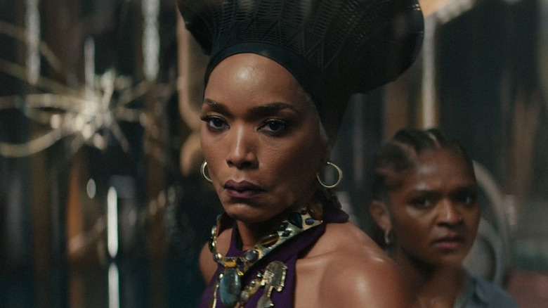 Queen Ramonda (Angela Bassett) protects Riri Williams (Dominique Thorne) in Black Panther: Wakanda Forever