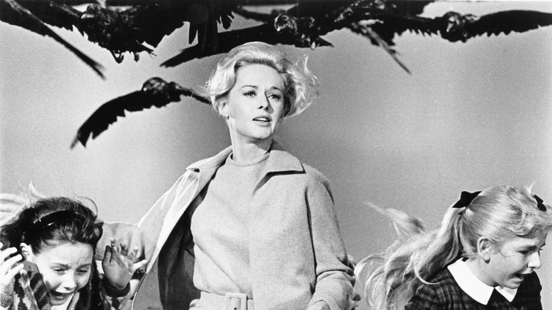 Tippi Hedren fleeing winged assailants in Alfred Hitchcock's classic thriller The Birds