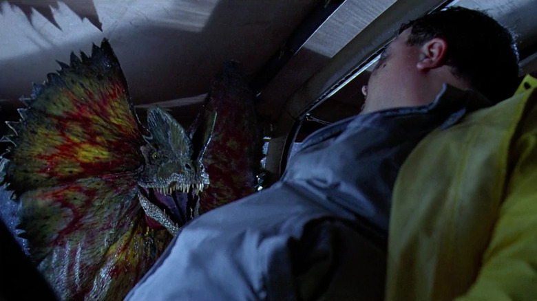 Dilophosaurus about to kill Nedry Jurassic Park