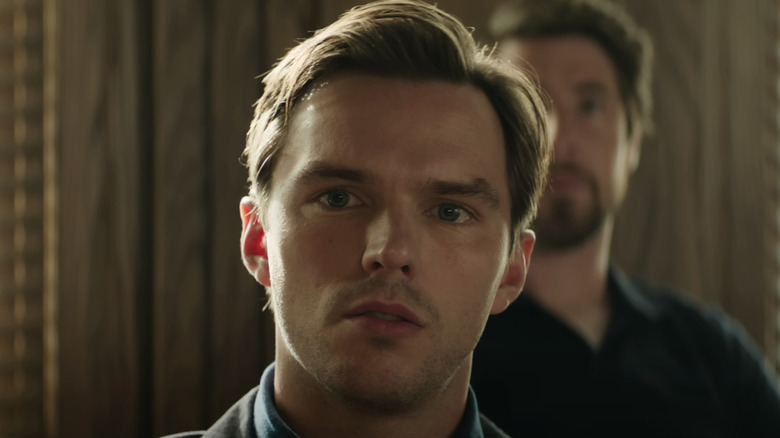 Nicholas Hoult's Justin Kemp sits in a jury box in Juror #2