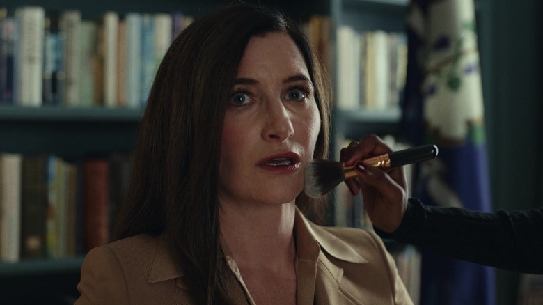 Kathryn Hahn as Claire Debella, having her makeup done by a TV crew in Glass Onion: A Knives Out Mystery