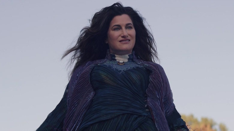 Kathryn Hahn as Agatha Harkness, hovering above westview in WandaVision