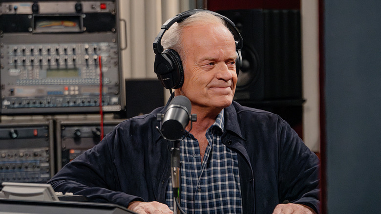 Kelsey Grammer's Frasier Crane sits behind his microphone in his KACL studio in Frasier