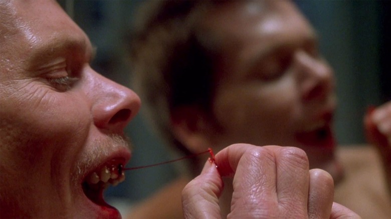 Kevin Bacon pulling tooth Stir of Echoes