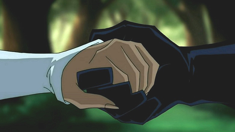 Batman holds Ace's hand 