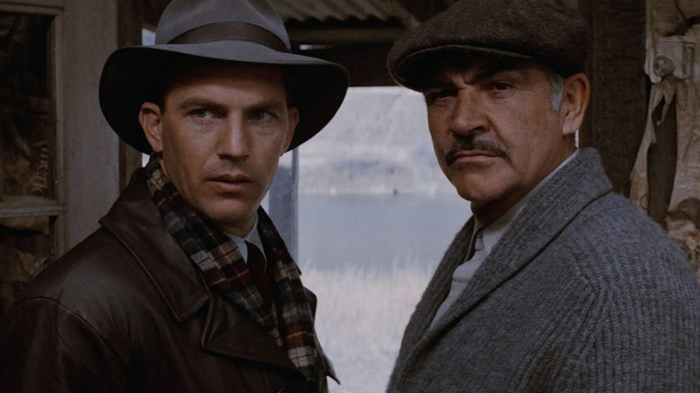 Kevin Costner as Eliot Ness and Sean Connery as Malone want out of Canada in The Untouchables