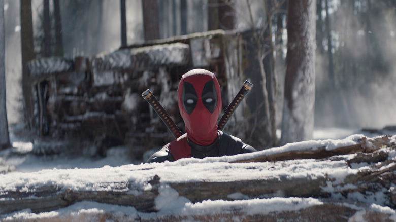 Luta de neve entre Deadpool e Wolverine 