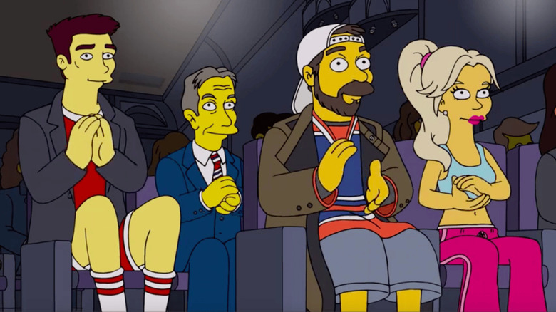 Kevin Smith, along with other celebrities, sitting in the audience of the (fake) series finale of "The Simpsons."