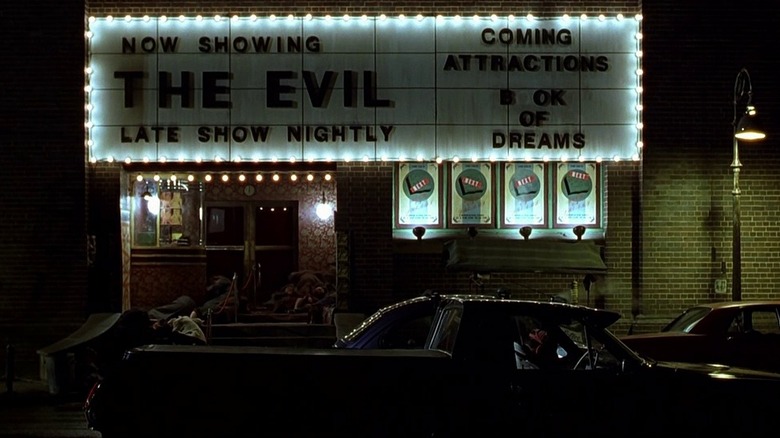 Dark City movie theater showing "the evil" and "of dreams"