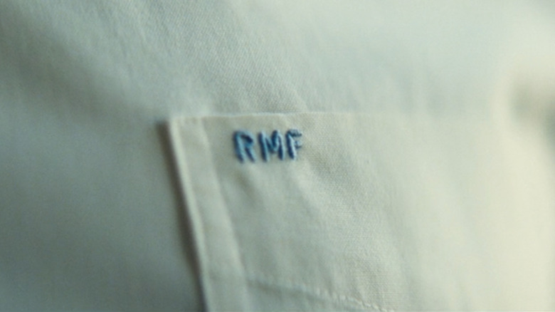 The RMF embroidered on R.M.F.'s shirt in Kinds of Kindness