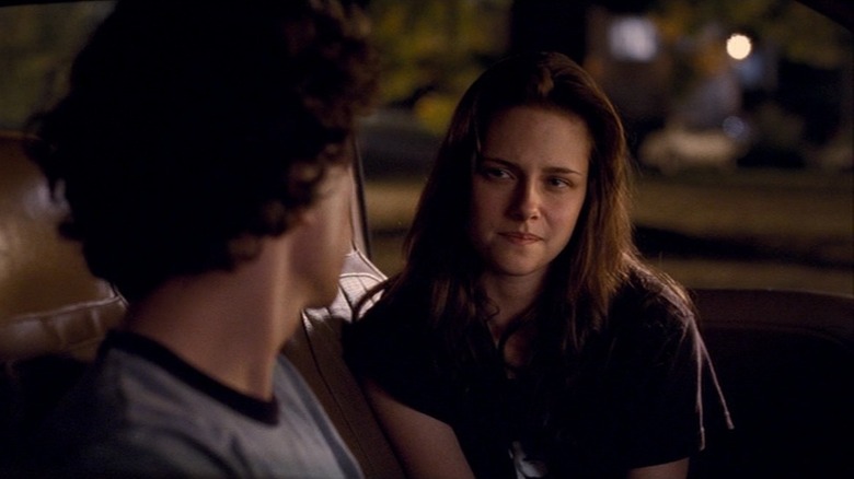 Kristen Stewart gazes at Jesse Eisenberg in a car in Adventureland