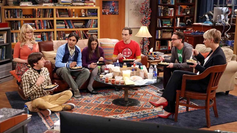 Howard, Bernadette, Raj, Amy, Sheldon, Leonard, and Penny eating dinner on The Big Bang Theory