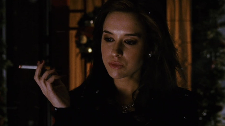 Lacey Chabert as Dana has a cigarette in Black Christmas