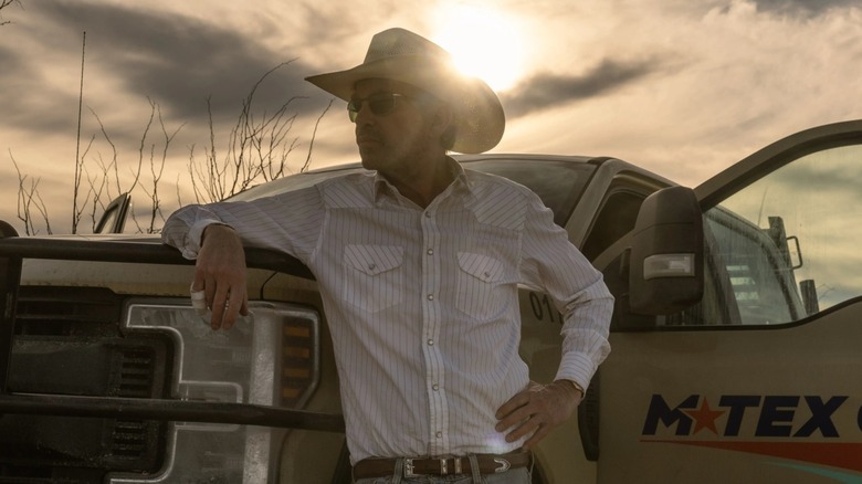 Tony Norris leaning on a truck