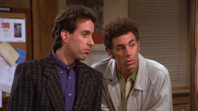 Jerry Seinfeld confers with Michael Richards as Cosmo Kramer in Seinfeld