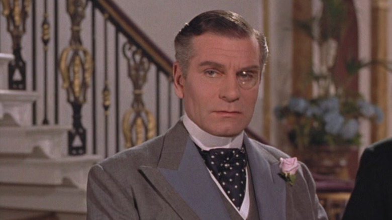 Laurence Olivier looks through his monocle in The Prince and the Showgirl