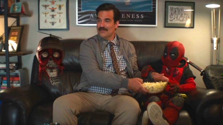 Headpool, Peter, and Kidpool on a couch in Deadpool and Wolverine