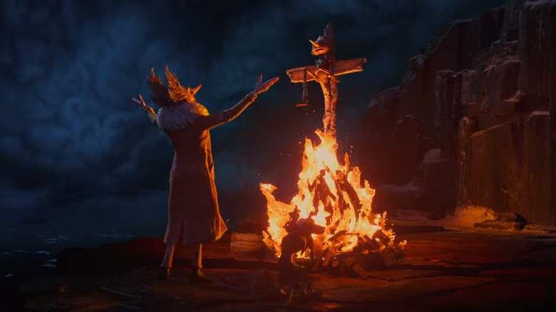 Pinocchio being burned at the stake in Guillermo del Toro's Pinocchio