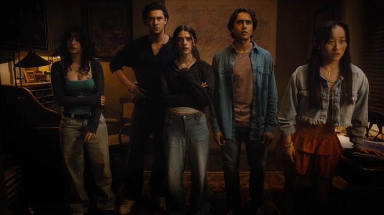 Until Dawn cast looking at a wall