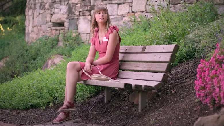 Love on the Spectrum US girl on a bench