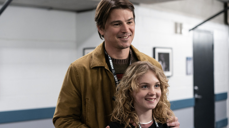 Josh Hartnett as Cooper and Ariel Donoghue as RIley looking excited in Trap