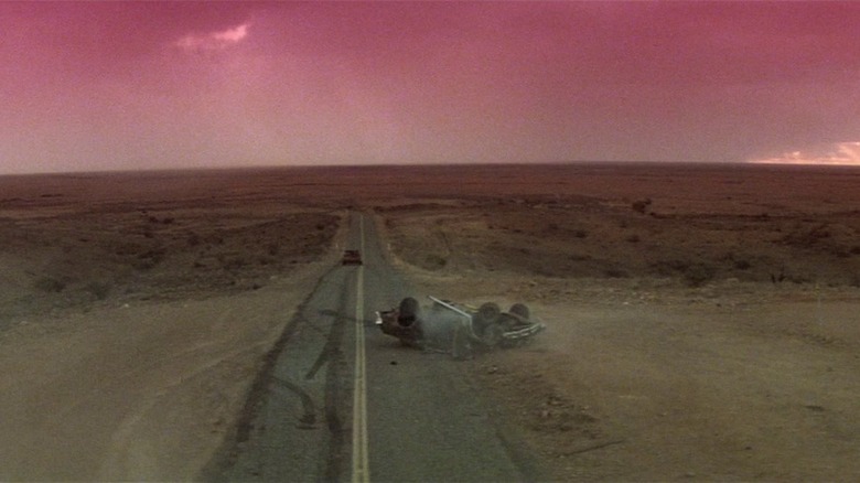 Mad Max 2 wrecked car in desert