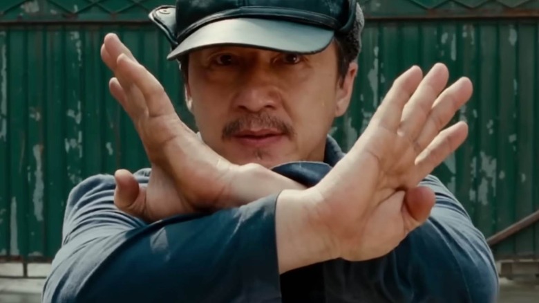 Han holding his hands up in The Karate Kid (2010)