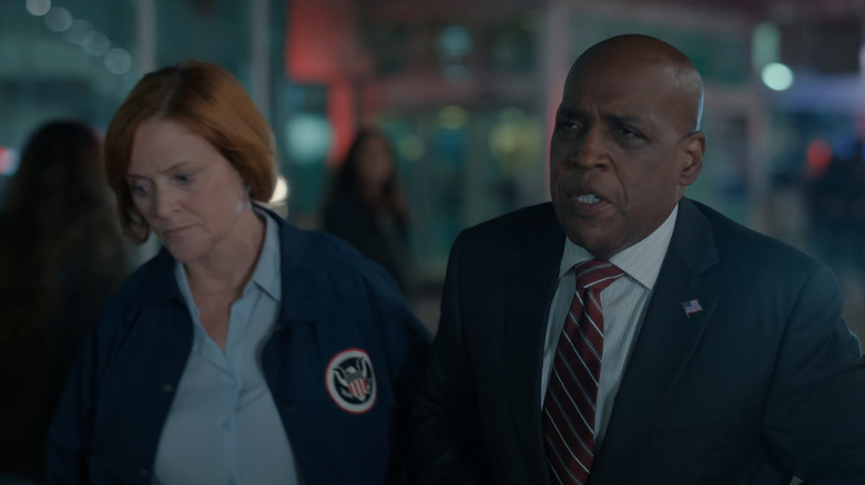 Daryl Edwards as Robert Vance, walking with an FBI agent on Manifest