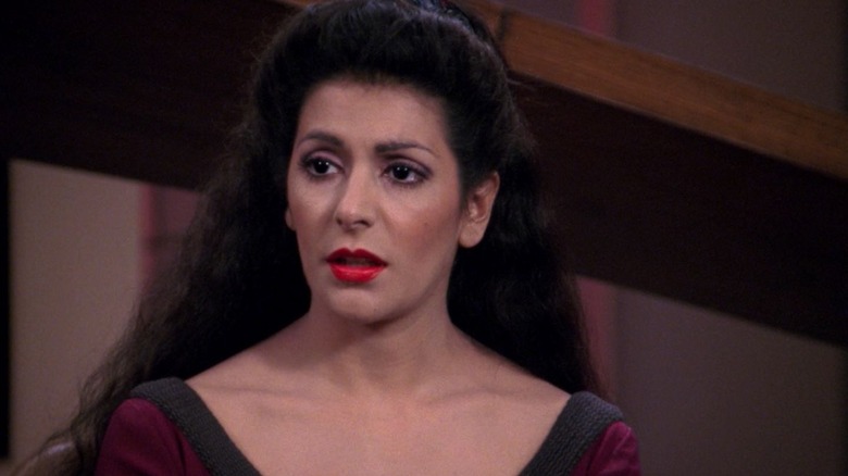 Counselor Troi talking to the captain in Star Trek: The Next Generation.