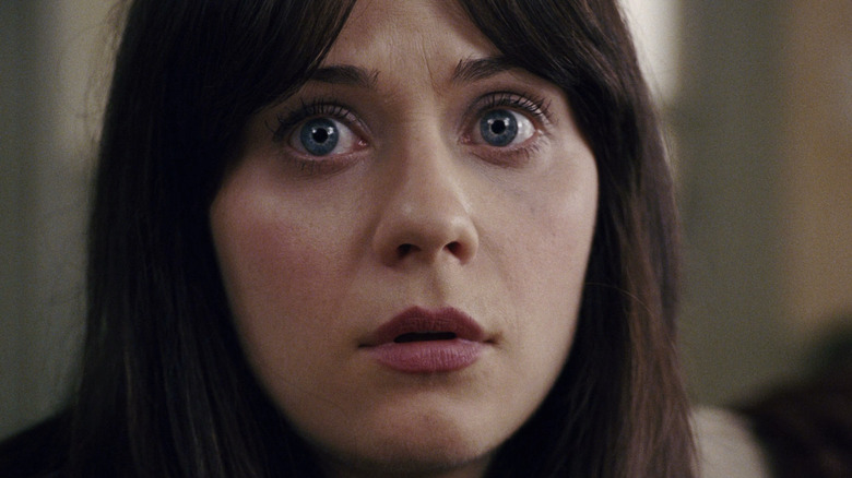 Zooey Deschanel as Alma staring intently in The Happening