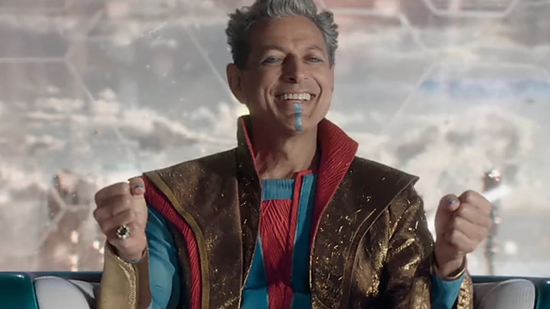 A jubilant Grandmaster in signature gold/blue robes in Thor: Ragnarok